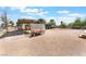 An extensive lot featuring an animal shelter and an extended canopy area at 4905 Ricky Rd, Las Vegas, NV 89130