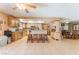 Open-concept kitchen and dining area featuring wood cabinets and tile flooring at 4905 Ricky Rd, Las Vegas, NV 89130