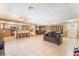 Expansive living area with an open floor plan leading into the kitchen and dining spaces at 4905 Ricky Rd, Las Vegas, NV 89130