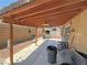 This covered back patio offers ample space for entertaining or relaxing outdoors at 4910 Marywood Ct, Pahrump, NV 89061