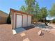 This charming backyard shed is perfect for storage, with neutral exterior and easy access at 4910 Marywood Ct, Pahrump, NV 89061