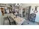 Open dining area with tile floors and sliding doors leading to the backyard at 4910 Marywood Ct, Pahrump, NV 89061