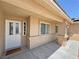 Inviting front entrance featuring a decorative glass door, neutral exterior, and a 'Welcome Home' doormat at 4910 Marywood Ct, Pahrump, NV 89061