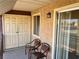 Enclosed balcony with sliding glass door, tiled floor, and seating at 5020 Indian River Dr # 432, Las Vegas, NV 89103