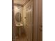 Compact powder room with stylish tile flooring and ample storage at 508 Candy Mint Ave, Las Vegas, NV 89183