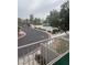 View of a community pool and street from an elevated vantage point at 508 Candy Mint Ave, Las Vegas, NV 89183