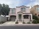 Charming two-story home featuring a balcony, covered porch, and attached garage at 508 Candy Mint Ave, Las Vegas, NV 89183