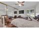 Bedroom featuring built-in closet, neutral walls, and ceiling fan at 5083 Village Dr, Las Vegas, NV 89142