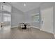 The dining room is light and bright with tile flooring at 5509 Rose Thicket St, Las Vegas, NV 89130