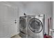 Laundry room featuring a side-by-side washer and dryer at 5509 Rose Thicket St, Las Vegas, NV 89130