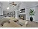 Cozy living room with fireplace and open floor plan at 5509 Rose Thicket St, Las Vegas, NV 89130