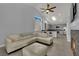 Comfortable living room flowing into the kitchen at 5509 Rose Thicket St, Las Vegas, NV 89130