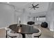 A modern living area features tile floors, high ceilings, and updated decor at 5509 Rose Thicket St, Las Vegas, NV 89130