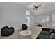 Open living room with vaulted ceilings and neutral color palette at 5509 Rose Thicket St, Las Vegas, NV 89130