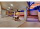 This spacious covered patio has room for dining and overlooks the backyard pool and garden at 5509 Rose Thicket St, Las Vegas, NV 89130