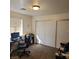 Neutral bedroom offering a window and closet at 561 E Bourbon St, Pahrump, NV 89048