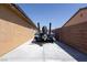 Long driveway leading to home with desert landscaping for convenient parking and curb appeal at 5761 E Badlands Ln, Pahrump, NV 89061