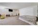 Spacious bedroom with an ensuite bathroom and a view to another room at 5907 Zawawi Ct, Las Vegas, NV 89110