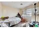 Cluttered bedroom with natural light from window with blinds at 5907 Zawawi Ct, Las Vegas, NV 89110