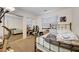 Bedroom with mirrored closet doors providing a spacious feel at 5907 Zawawi Ct, Las Vegas, NV 89110