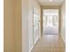 Inviting entryway featuring tile flooring and a clear view of the living area at 6808 Mystic Plain Ct, Las Vegas, NV 89149