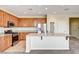 Beautiful kitchen with granite countertops, stainless steel appliances, and a center island at 6808 Mystic Plain Ct, Las Vegas, NV 89149