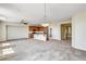 Open-concept living space featuring a kitchen with stainless steel appliances and center island at 6808 Mystic Plain Ct, Las Vegas, NV 89149