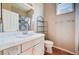 Bathroom with a sink, mirror, and decorative shower curtain at 7813 Falconwing Ave, Las Vegas, NV 89131