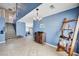 Grand entryway boasts a wooden accent wall and tiled flooring at 7813 Falconwing Ave, Las Vegas, NV 89131