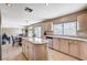 Kitchen offers an island and view into the dining room at 7813 Falconwing Ave, Las Vegas, NV 89131