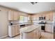 Kitchen featuring granite counters, stainless steel appliances, and ample cabinet space at 7813 Falconwing Ave, Las Vegas, NV 89131