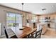 Kitchen has wooden cabinets and a large island at 7813 Falconwing Ave, Las Vegas, NV 89131
