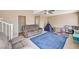 Living room features two sofas, a rug, and toys at 7813 Falconwing Ave, Las Vegas, NV 89131
