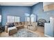 Cozy living room with a sectional sofa, plenty of room for entertaining guests at 7813 Falconwing Ave, Las Vegas, NV 89131