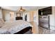 Open main bedroom with a ceiling fan, and views to the bathroom and closet at 7813 Falconwing Ave, Las Vegas, NV 89131