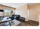 Upstairs office space featuring wood floors, a desk setup, and a view of the outdoors at 7813 Falconwing Ave, Las Vegas, NV 89131