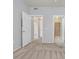 Open bedroom showcases an open doorway leading to another room and a doorway to the walk-in closet at 855 N Stephanie St # 2415, Henderson, NV 89014