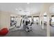 Bright and airy fitness center with multiple exercise machines and mirrors at 855 N Stephanie St # 2415, Henderson, NV 89014