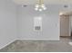 Bright, open living area with updated ceiling fixture and versatile layout at 855 N Stephanie St # 2415, Henderson, NV 89014