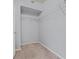 Walk-in closet with neutral carpeting and metal shelving at 855 N Stephanie St # 2415, Henderson, NV 89014