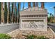 Elegant community entrance sign for Hillpointe, framed by mature trees and landscaping at 8928 Stafford Springs Dr, Las Vegas, NV 89134