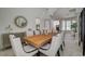 Elegant dining room showcases a modern table, and light fixtures, great for hosting guests at 8928 Stafford Springs Dr, Las Vegas, NV 89134