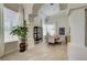 Bright dining room with elegant furniture, a large window, and recessed lighting at 8928 Stafford Springs Dr, Las Vegas, NV 89134