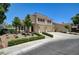 Charming two-story home features desert landscaping, a tile roof, and an attached two-car garage at 8928 Stafford Springs Dr, Las Vegas, NV 89134