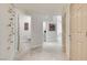 Hallway with unique wall decor leading to bathrooms and other rooms at 8928 Stafford Springs Dr, Las Vegas, NV 89134