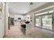 Modern kitchen with white cabinets, marble island, and stainless steel appliances at 8928 Stafford Springs Dr, Las Vegas, NV 89134