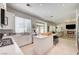 Bright kitchen with stainless steel appliances, island seating, and an open floor plan at 8928 Stafford Springs Dr, Las Vegas, NV 89134