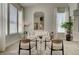 Serene sitting room features large windows and comfortable seating, creating a relaxing atmosphere at 8928 Stafford Springs Dr, Las Vegas, NV 89134