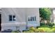 Well-maintained exterior with manicured landscaping, lush greenery, and mature trees at 9050 W Warm Springs Rd # 1092, Las Vegas, NV 89148