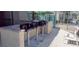 Outdoor grilling area with built-in grills, counter space, and nearby seating at 9050 W Warm Springs Rd # 1092, Las Vegas, NV 89148